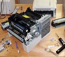 Repairs specialized printer . Plotter . Fax and
