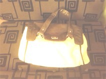 Female handbag . Cream color.. foreign. کنفی. Style.