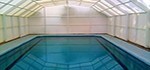 Swimming pool roof, movable and fixed pool cover