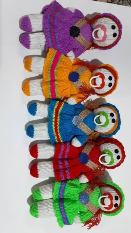 Production and distribution of machine woven dolls