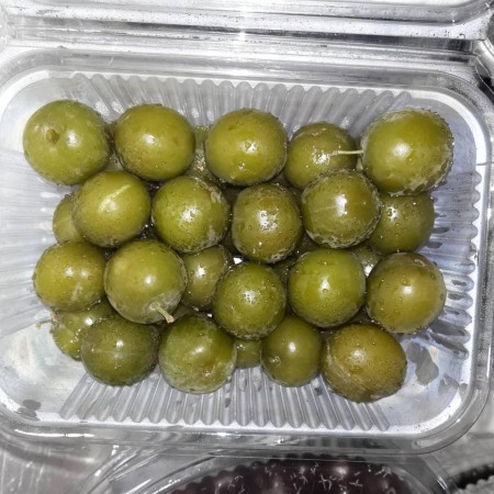 Selling frozen green tomatoes this season