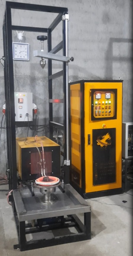 Induction furnace for industrial hardening of shafts and gears