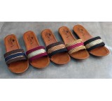 Production and distribution of slippers, shoes and sandals for men, women and children