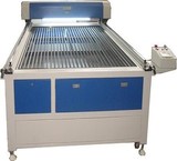 Engraving machine and laser cutting machine