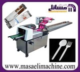 Packaging machine, spoon and fork