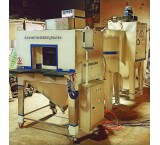 Automated dental implant sandblasting machine
