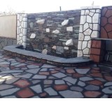 Scrap stone contractor