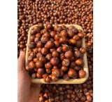 Sale of fresh and roasted shiny salted hazelnuts
