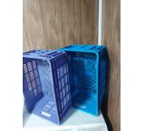 A 2 kg slaughterhouse basket with a row of standing chickens