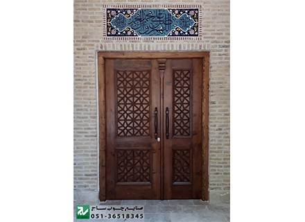 Wooden door entrance to the building, apartments and places of the traditional Chinese knot
