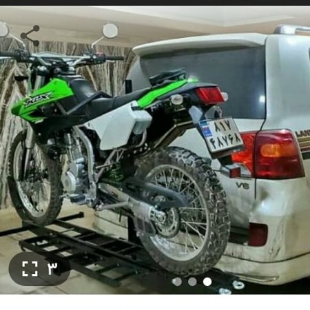 Motocross strap behind the car