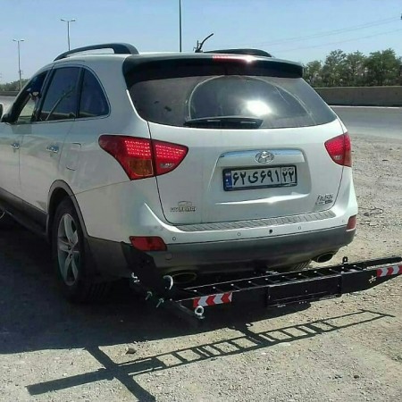 Motocross strap behind the car