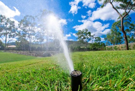 Design and implementation of drip and sprinkler irrigation system
