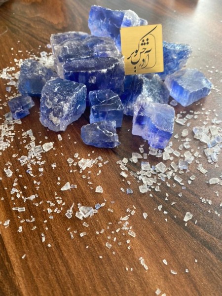 Blue salt in the form of crystals and granulation