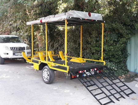 Four-wheel engine trailer with tent