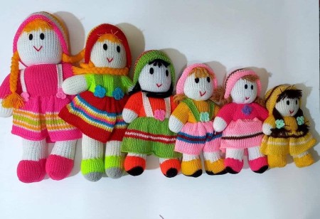 Production and distribution of machine woven dolls
