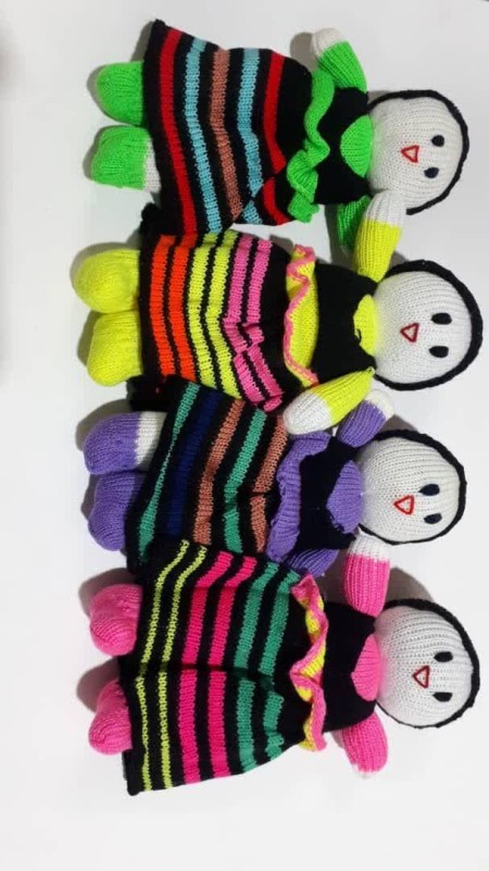 Production and distribution of machine woven dolls