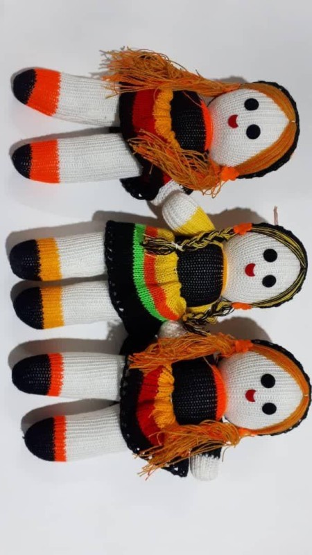 Production and distribution of machine woven dolls