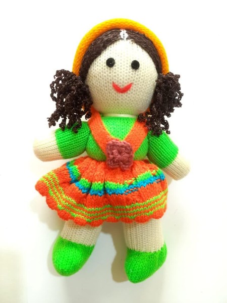 Production and distribution of machine woven dolls