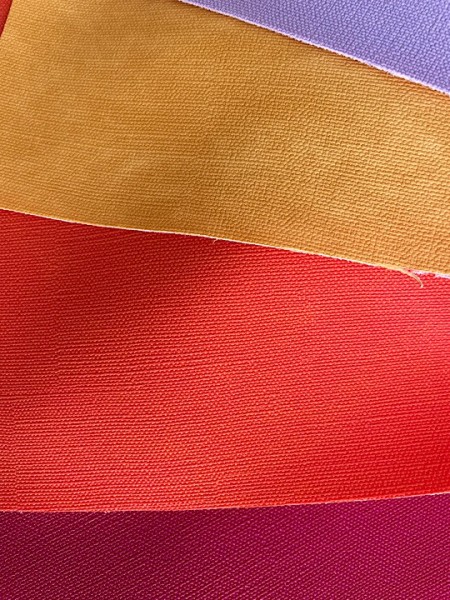 A leather bag made of artificial leather with a wreath design