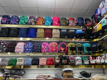 A leather bag made of artificial leather with a wreath design