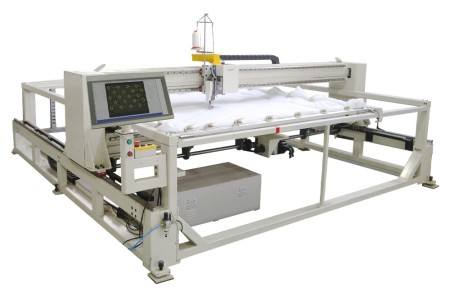 Single head quilting machine
