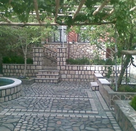 Landscaping of the garden with sheet stone
