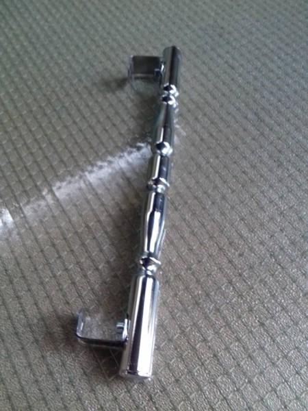 Steel handle on the hinge of the elevator