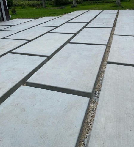 Exposed concrete floor and wall panel