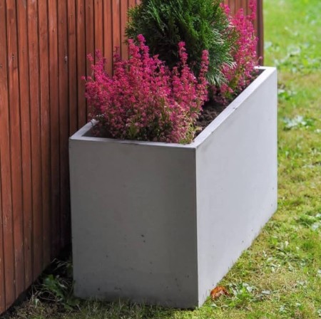 Exposed concrete flower box