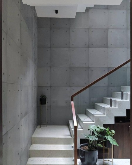 Exposed concrete wall and floor covering panel