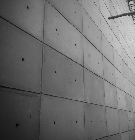 Exposed concrete floor and wall panel