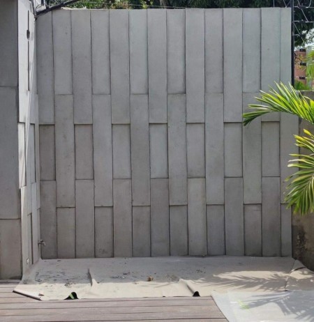 Exposed concrete floor and wall panel