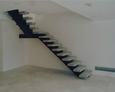 Exposed concrete stairs and floors