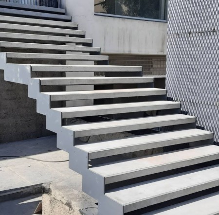 Exposed concrete stairs and floors