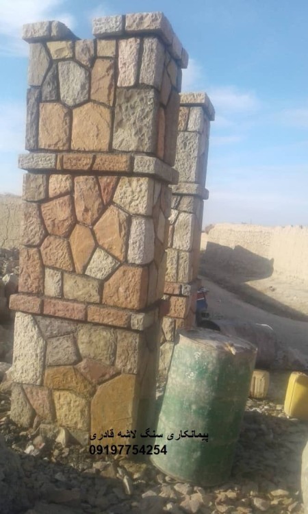 Implementation of Malon Klum stone for the Chinese wall, installation of the column at the top of th ...