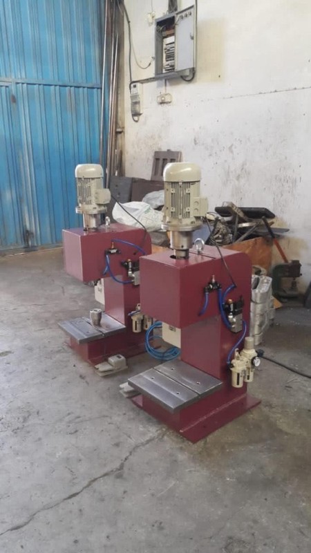 Rubbing rivet press machine