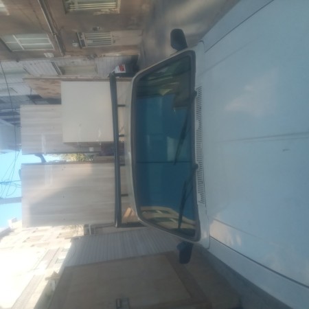 Pickup truck carrying cargo all the spots