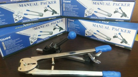 Manual belt tensioner packing belt