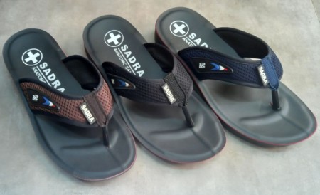 Production and distribution of slippers, shoes and sandals for men, women and children