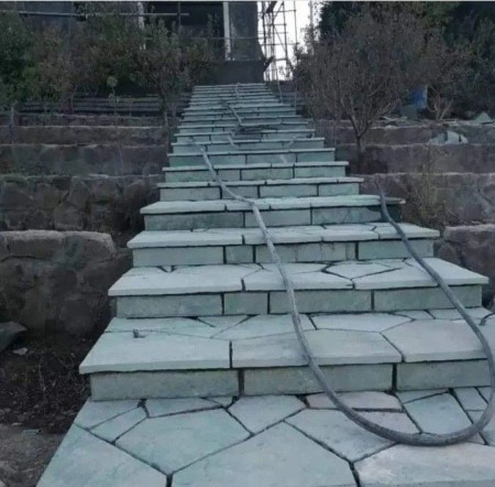 اجرای سنگ قولوه  برای  طراحی آبنما سنگ قولوه