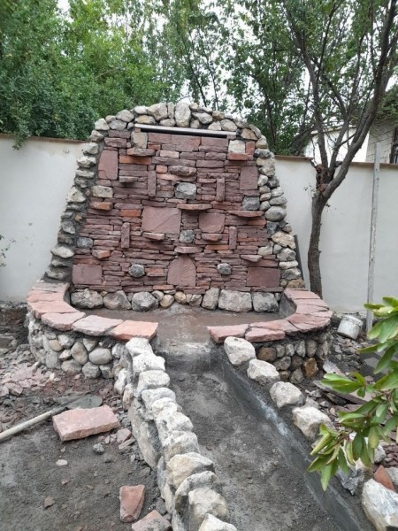 پیمانکاری سنگ لاشه اجرای نمای آبنما از سنگ پرت