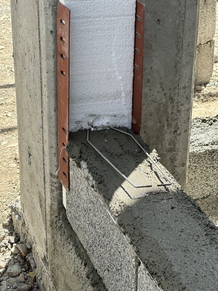 Broken studs towards the wall post of the building