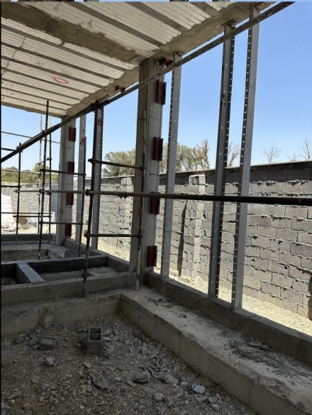 Broken studs towards the wall post of the building