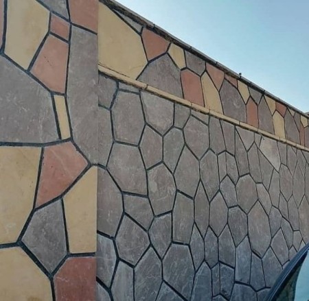 Implementation of rubble stone wall facade of rubble stone