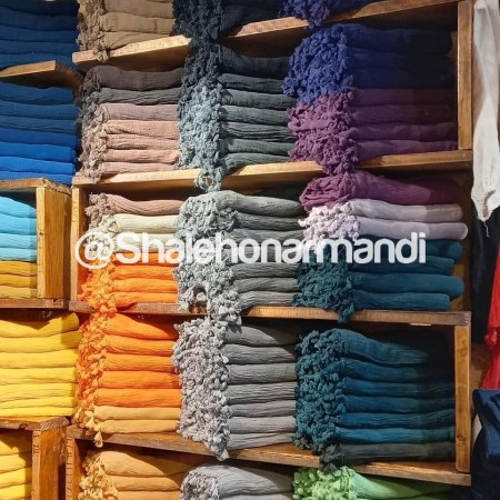 Natural fiber shawl with tassels