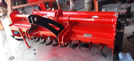 Rotivator behind the tractor