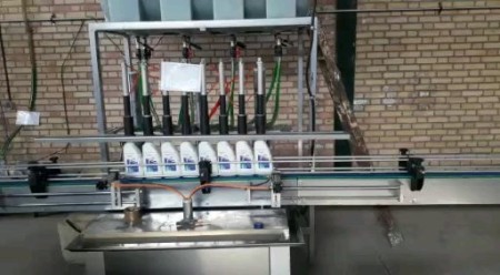 دستگاه پرکن مایعات رقیق با دربند اتومات