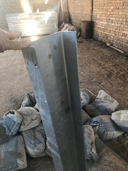 The base of the road guardrail and urban