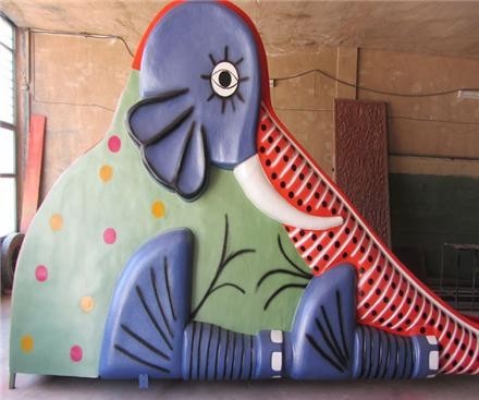 Golden fiberglass park slides